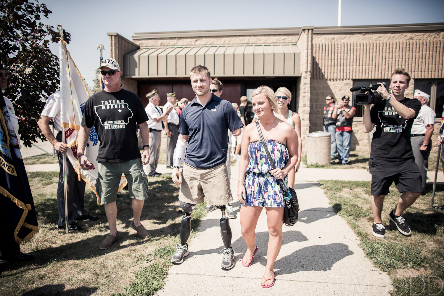 Taylor Morris, quad amputee, comes home to a parade in Waterloo and Cedar Falls Iowa, photographed by photographer Tim Dodd Photography, Taylor Morris Otto Bock X2 double above knee amputation